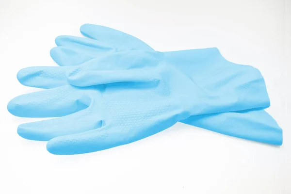 Синие резиновые перчатки, изолированные на белом фоне — стоковое фото