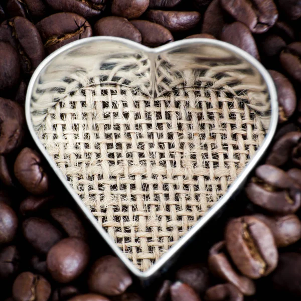 Ziarna kawy z sercem jak z bliska widok — Zdjęcie stockowe