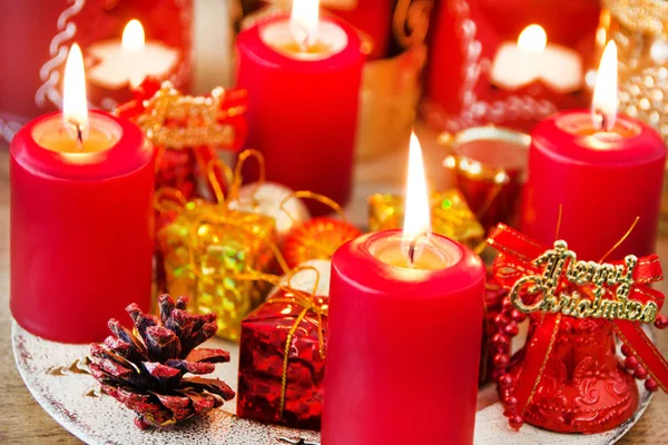 Christmas red candles with candle light and decoration