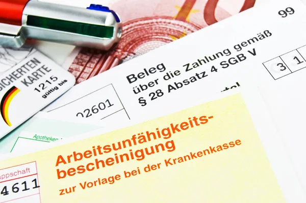 Немецкий сертификат о нетрудоспособности — стоковое фото