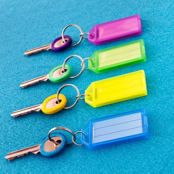 Key fob on blue background close-up view