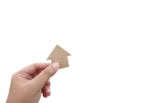 Häuserpapier in der Hand, isoliert auf weißem Hintergrund — Stockfoto