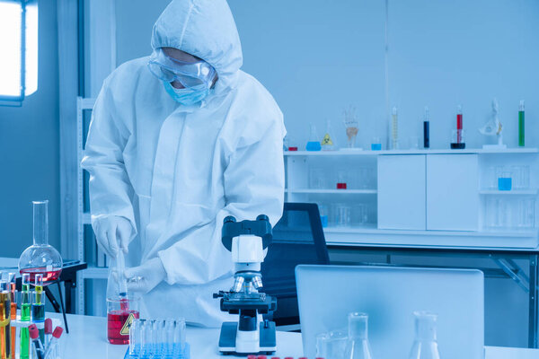 Researchers are inventing and testing antiretroviral drugs. In a safe high level laboratory. After that, the virus was examined by a microscope.