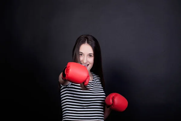 Pretty young sport woman with boxing gloves — Stock Photo, Image