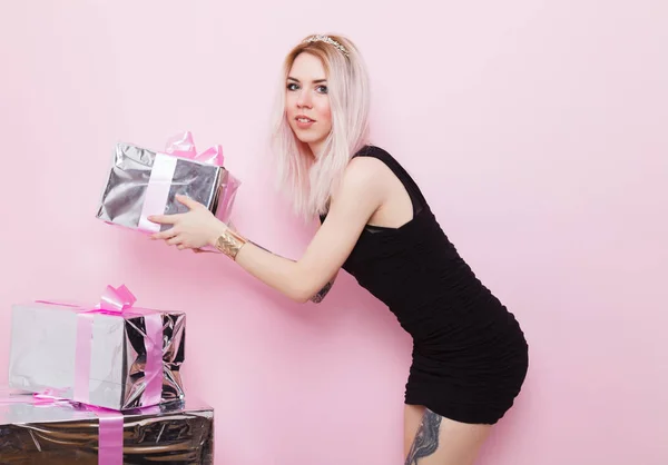 Beautiful woman with gift boxes