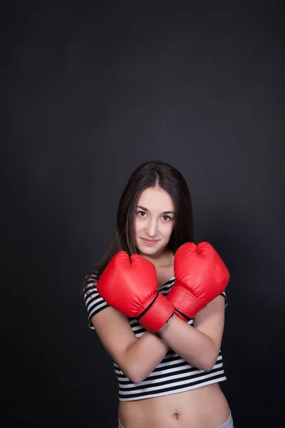 Woman boxer on black background — Stock Photo, Image