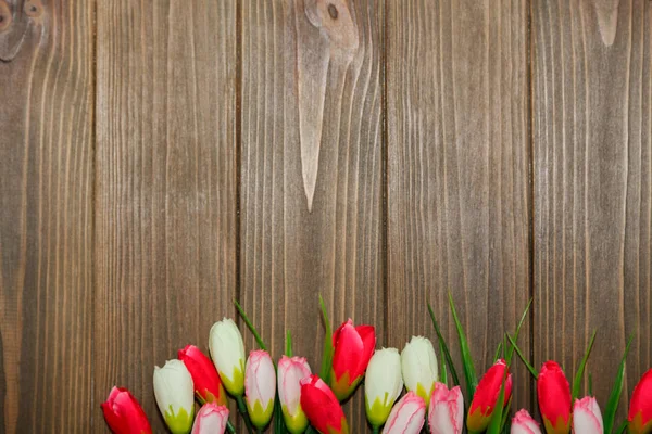 Flowers tulips on wooden boards — Stock Photo, Image