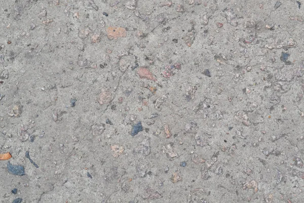 Pozadí ve formě cementové směsi a kamenů — Stock fotografie