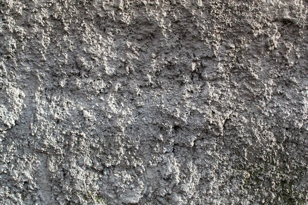 Parede de concreto com textura ao sol — Fotografia de Stock