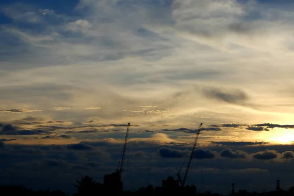 stock image Silhouette of Crane in Sunset Scenery Background with Space for Space Text.