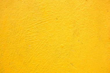 Sarı beton duvar arka plan.