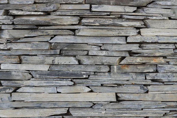 Capa de placa de piedra dispuesta como una pared — Foto de Stock