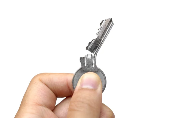 Fechar a mão segurando uma chave quebrada — Fotografia de Stock