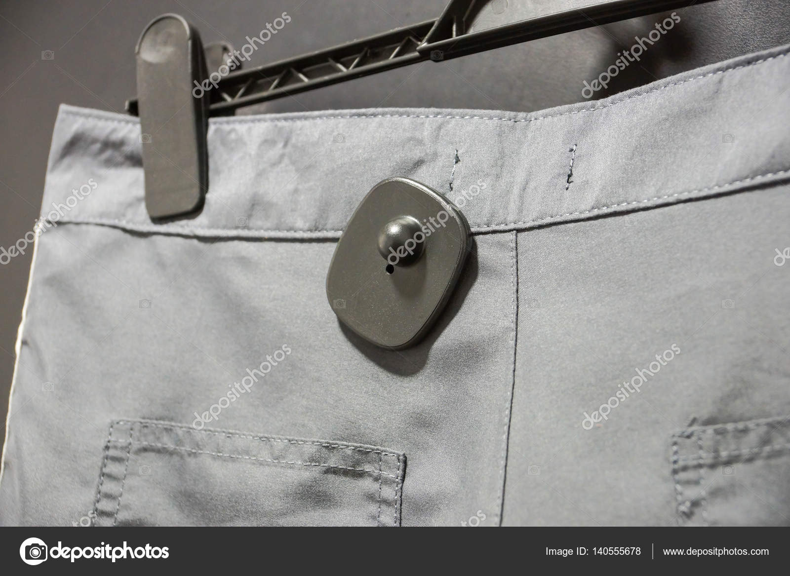 RFID hard tag for clothing Stock Photo by ©weerapat 140555678