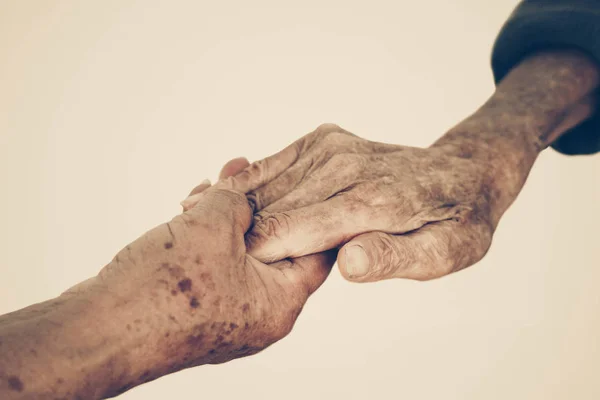 People holding hands — Stock Photo, Image