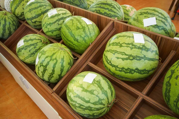 Organic watermelon on fruit stall