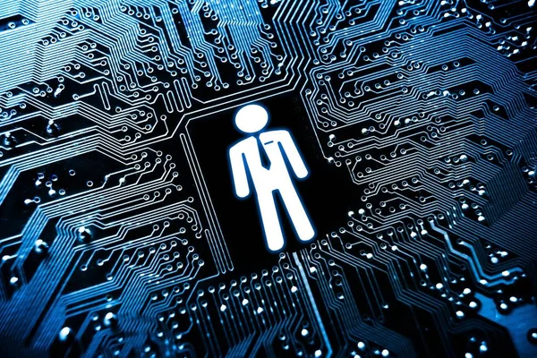 Businessman symbol on computer circuit board — Stock Photo, Image