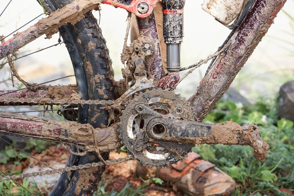 Dirty mountain bike covered with mud