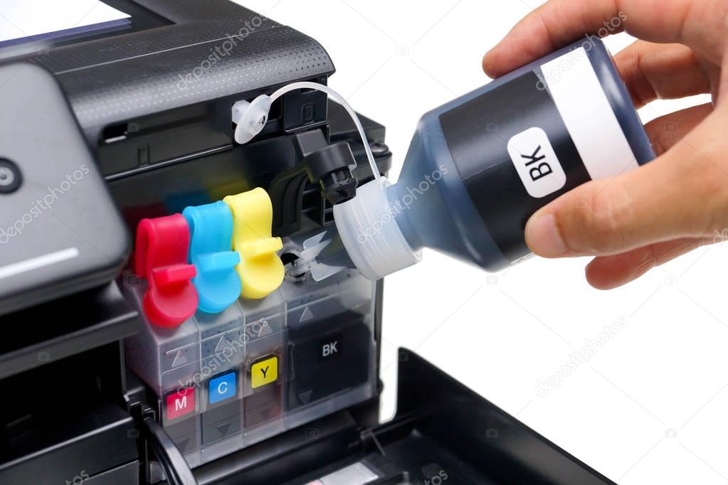 Refilling black ink into a ink tank of a printer