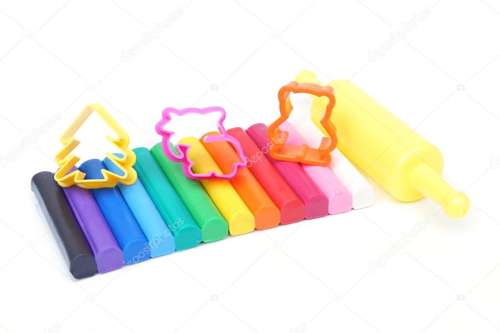 Colorful clay sticks for kids isolated on white