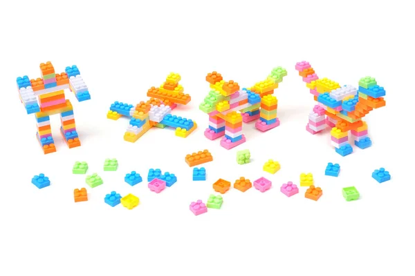 Coloridos Bloques Juguete Plástico Para Niños Diferentes Formas Aislados Blanco — Foto de Stock