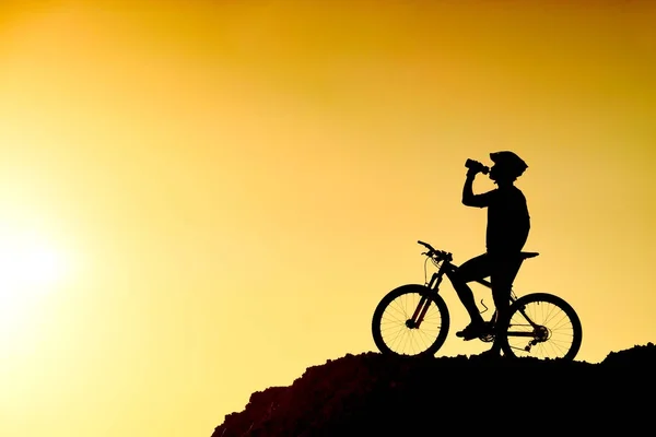 Male Cyclist Drinking Water Silhouette — Stock Photo, Image