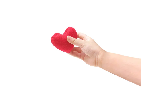 Рука Ребенка Держит Красное Сердце Белом Фоне — стоковое фото