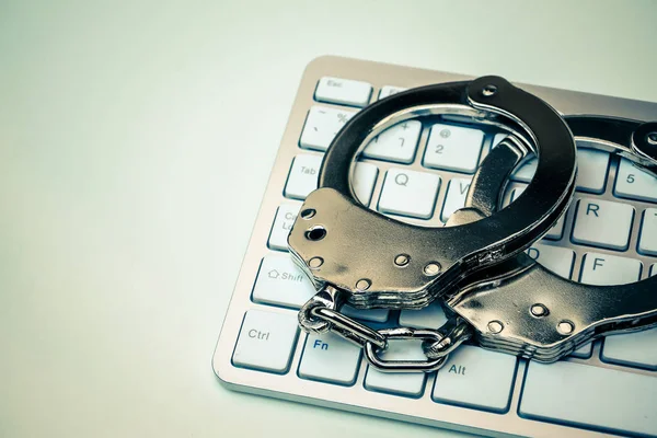 Handcuffs Computer Keyboard — Stock Photo, Image