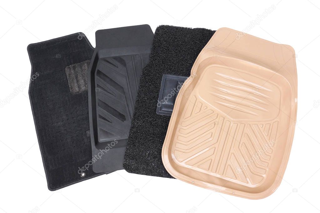 Different types of car mats isolated on white                               