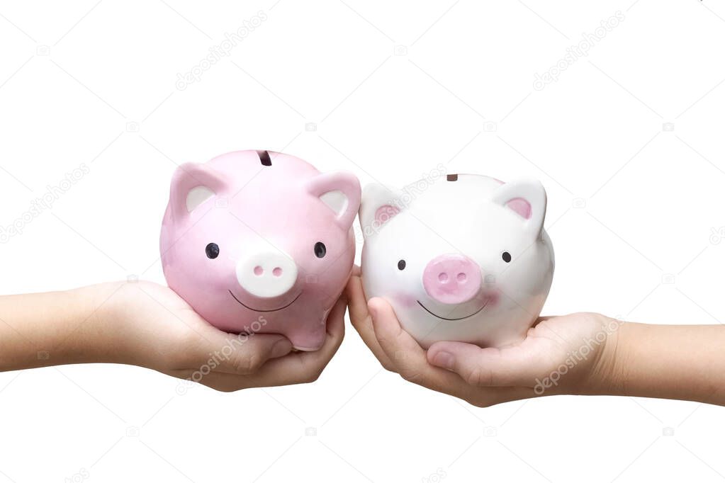 Saving money - Two kids holding piggy banks isolated on white background