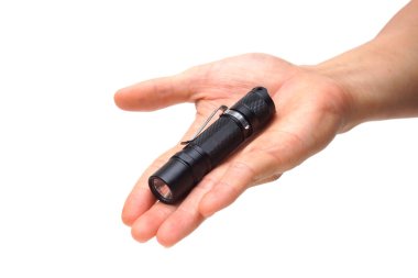 Küçük bir LED meşalesi tutan el feneri izole / günlük kullanım için el feneri                             