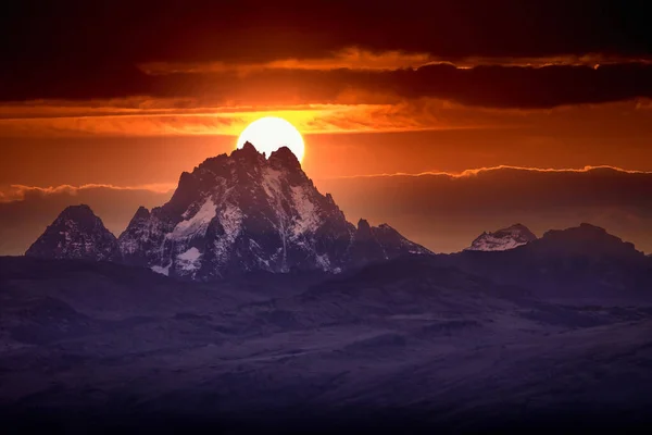 Beautiful early morning sunrise colors at mt.kenyas snowy peaks. Serena mountain lodge Kenya/Africa. Sunset, sunrise, mountain, scenery, peak, summit concepts.