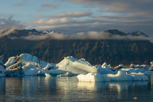Glacier and iceberg float around fjallsarlon/jokulsarlon glacier lagoon in Iceland. Melting and global warming concept.
