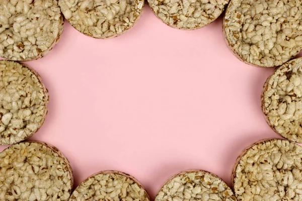 Crispbread frame on a pink background. Space for text. proper nutrition, Vegan — 스톡 사진