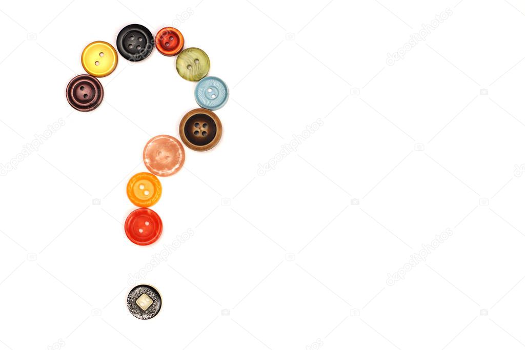 The question mark of the sewing buttons is isolated on white.