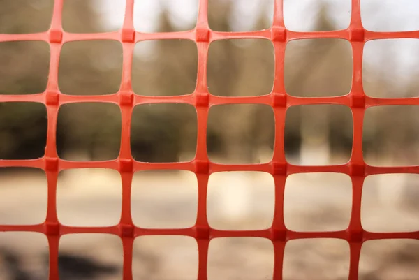 Maglia Plastica Rossa Vicino Sfondo Sfocato — Foto Stock