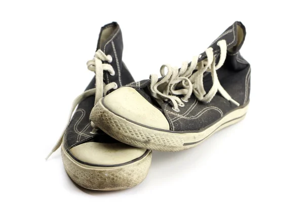 Old Retro Sneakers One Top Other Isolated White Royalty Free Stock Images