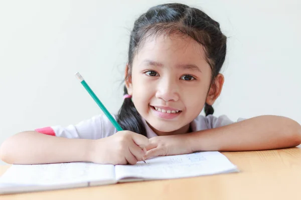 Portrait of Asian little girl in Thai kindergarten student unifo — Stock Photo, Image