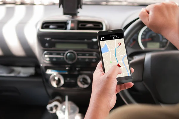 Hands of man using mobile smart phone with gps application in th — Stock Photo, Image