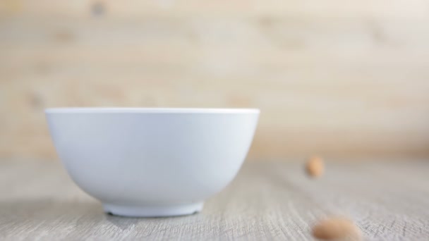 Raw Almond Falling Bowl Wooden Table Select Focus Shallow Depth — Stock Video