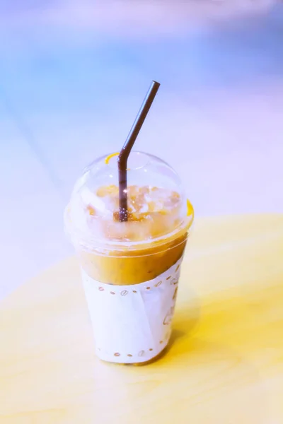 Iced coffee in takeaway cup