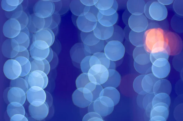Blue and orange bokeh abstract background.