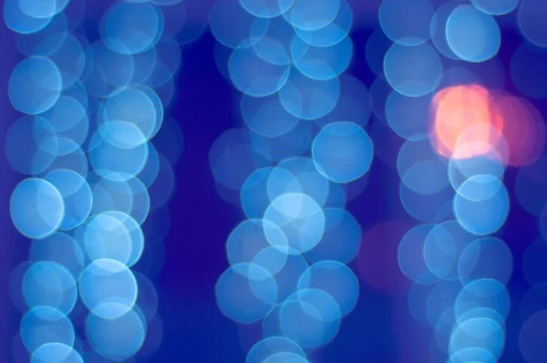 Blue and orange bokeh abstract background.