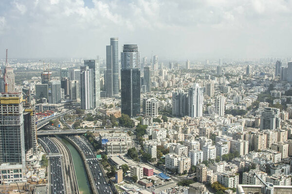 Panorama of the daytime city and river from a height