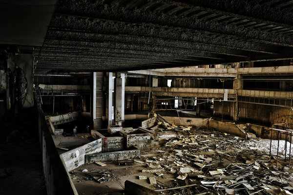 Huge halls of an abandoned shopping center
