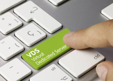 VDS Virtual Dedicated Server - Inscription on Green Keyboard Key. VDS Virtual Dedicated Server Written on Green Key of Metallic Keyboard. Finger pressing key. clipart
