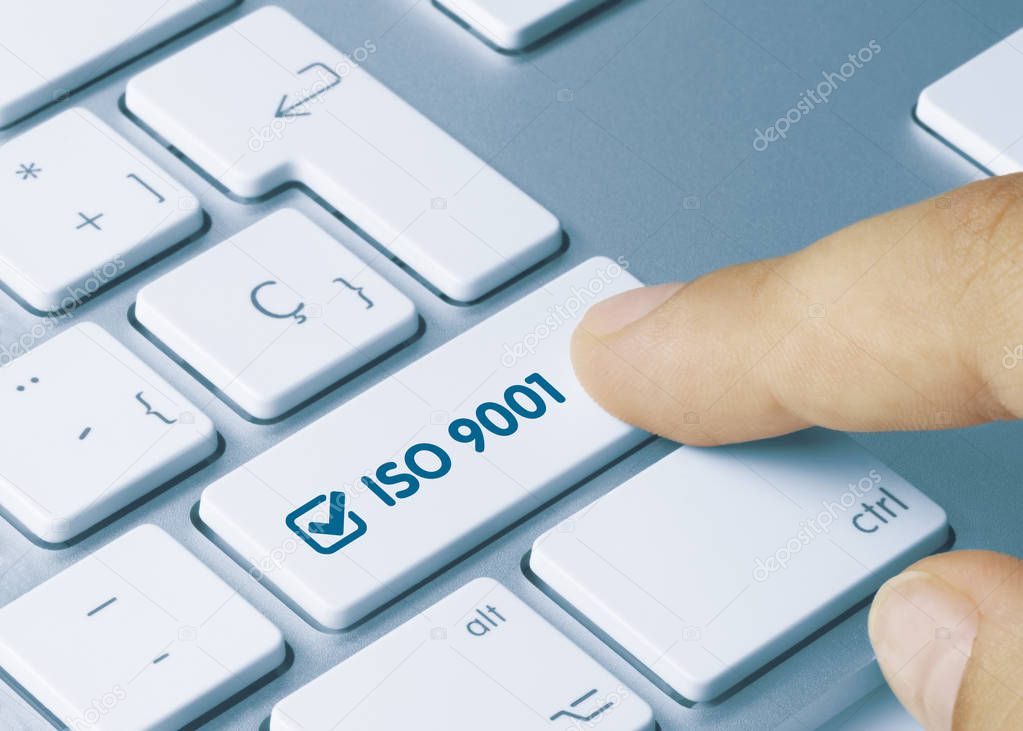 ISO 9001 - Inscription on Blue Keyboard Key