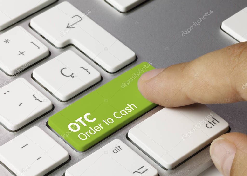 OTC Order to Cash- Inscription on Green Keyboard Key.