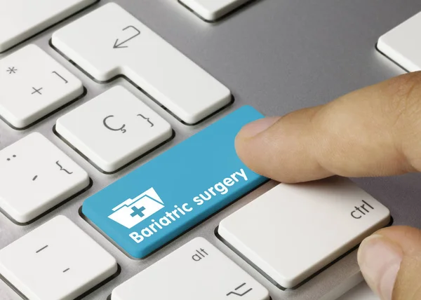 Cirugía bariátrica - Inscripción en tecla azul . —  Fotos de Stock