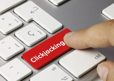 Clickjacking - Inscription on Red Keyboard Key. clipart